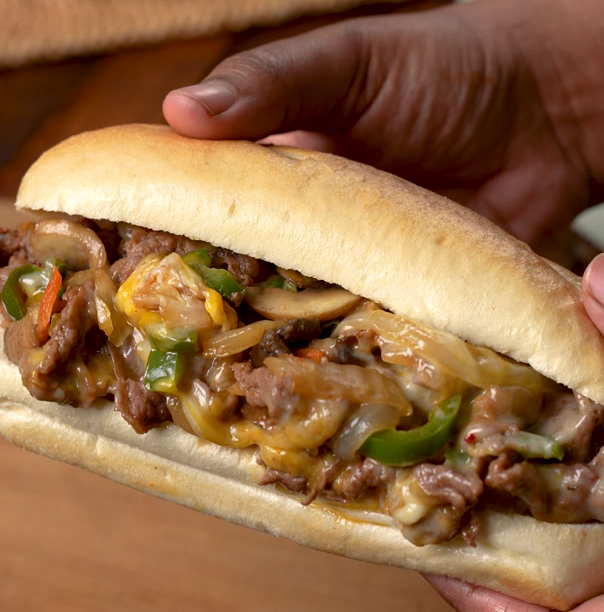 Spicy Kimchi Cheesesteaks Recipe